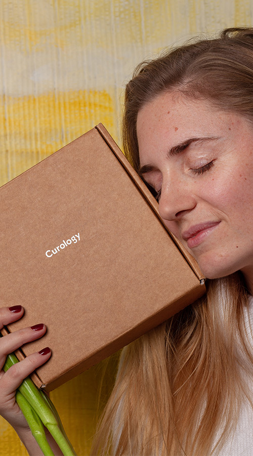 Woman with skin care products